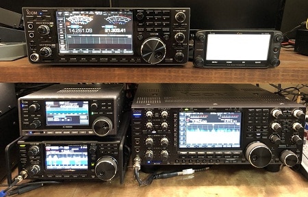 Different icom units on table