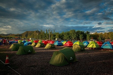 Different kinds of tents showcased outdoors