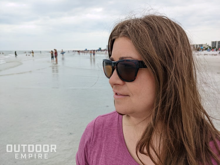 Woman wearing smith joya sunglasses on beach