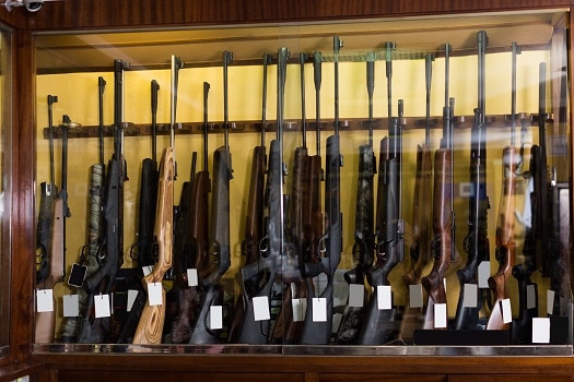 Gun store interior with specialized rifles