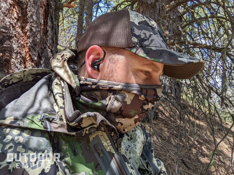 hunter wearing ear buds hearing protection