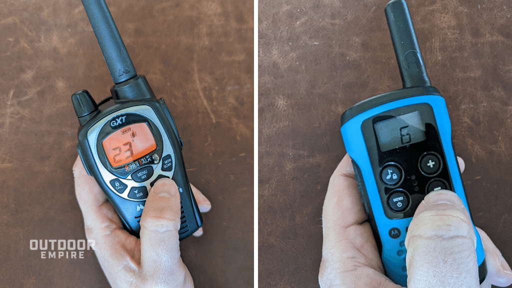 Man's hand changing channels on two different walkie talkies side by side